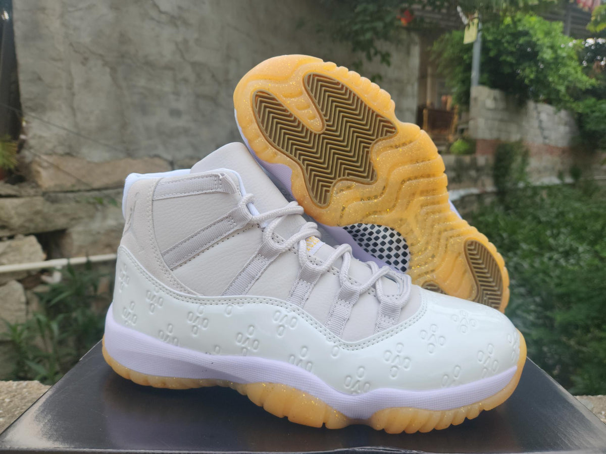 Air Jordan 11 Retro Low 'Yellow Snakeskin'