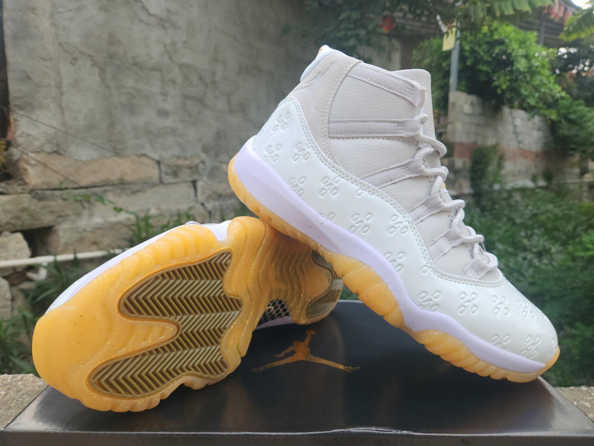 Air Jordan 11 Retro Low 'Yellow Snakeskin'